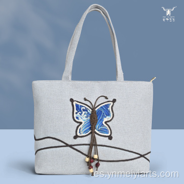 Elegante bolso de hombro de lino con mariposas coloridas para mujer